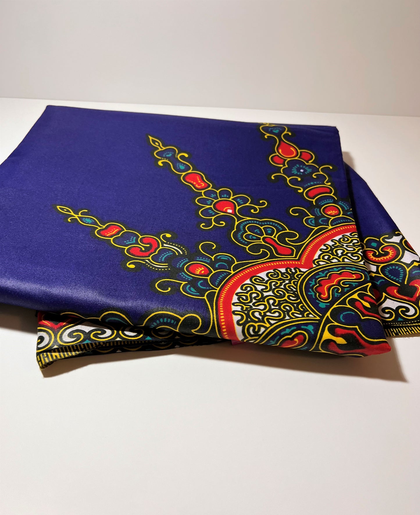 Royal Blue Fabric with Multicolor Spirals