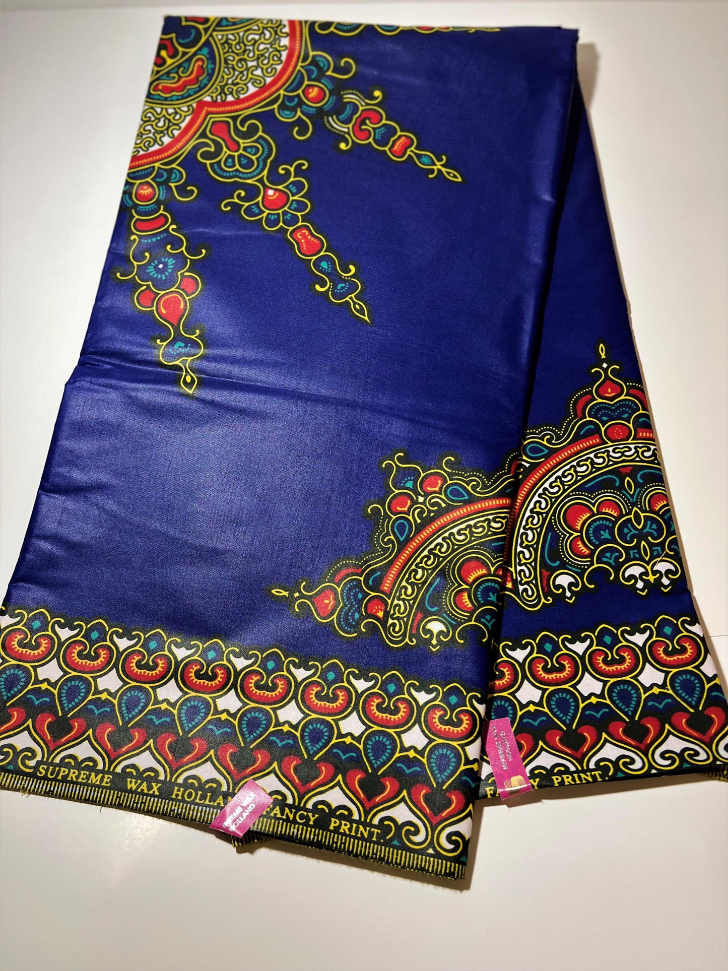 Royal Blue Fabric with Multicolor Spirals