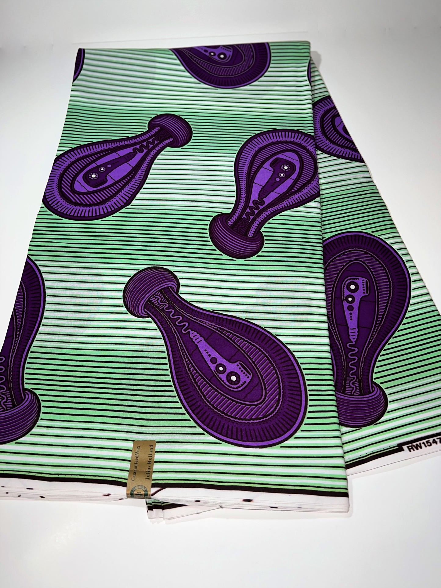 Green, Purple & White Designed Fabric