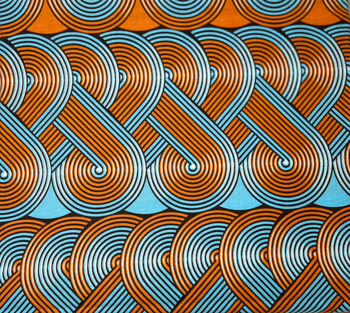 Orange & Blue Swirled Link Fabric