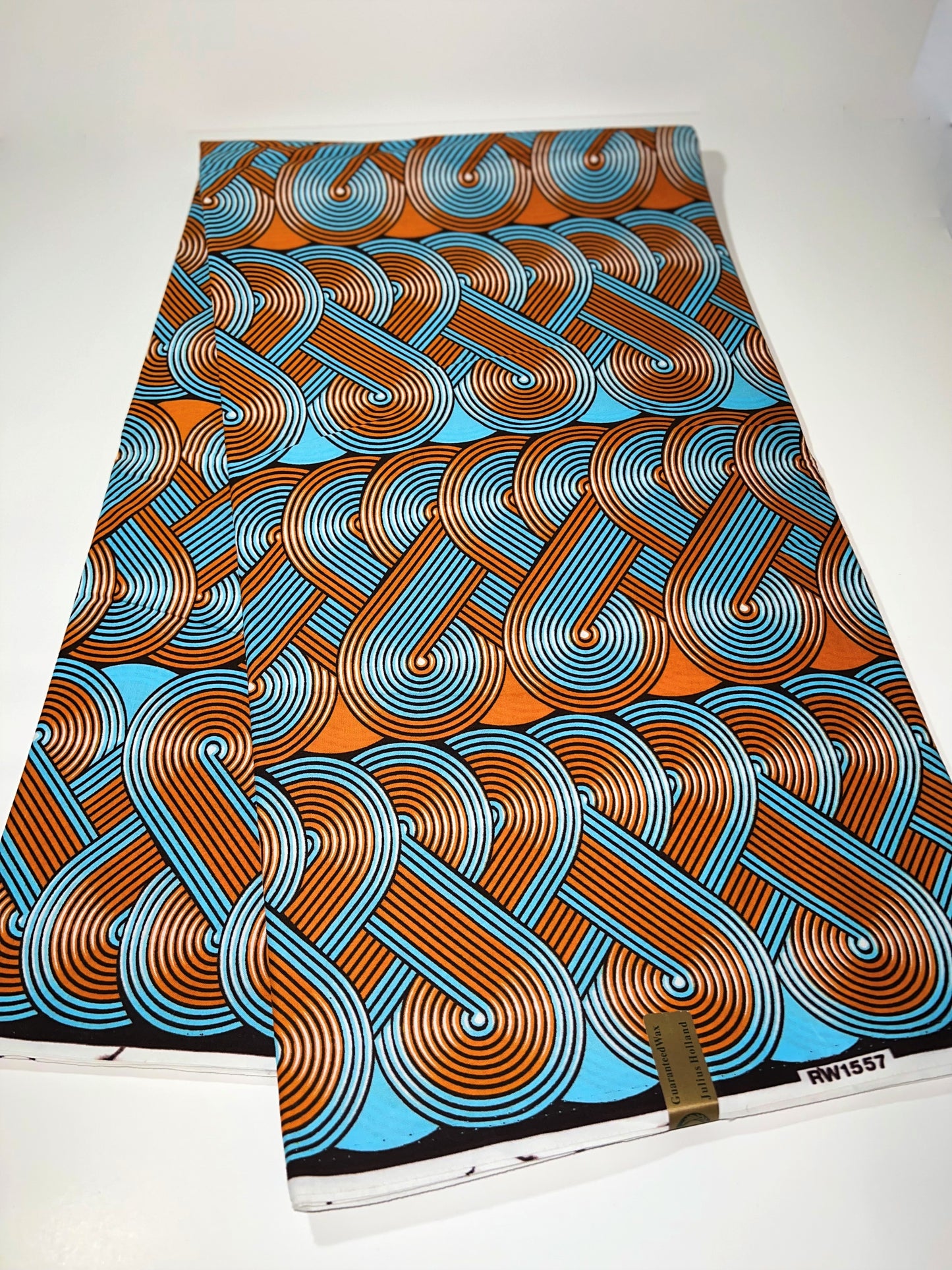 Orange & Blue Swirled Link Fabric