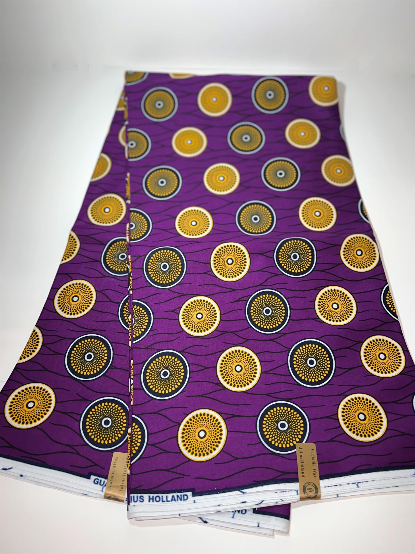 Purple Fabric with Gold & Black Circles